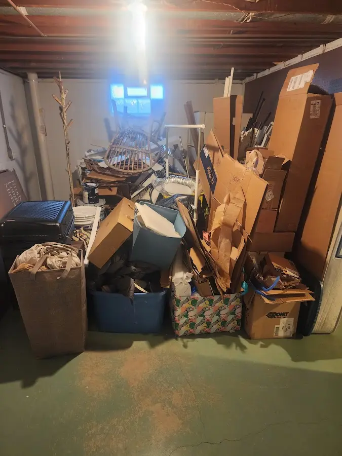 Roll-off dumpster container at job site for 15 Yard Dumpster Rental in St. James City